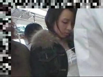 Japanese girl giving HJ on crowded train
