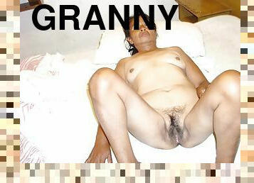 Granny Squeezes Her Giant Breasts With Big Nipples