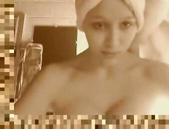 Beautiful chick films herself after taking a shower