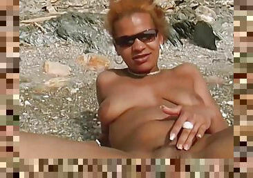 A Horny German Ebony Sucking A Hard Cock On The Beach