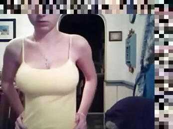 Slut in a tank top ready to take it off