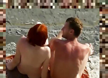 Sexy Red Haired Woman Blowjob On Nudist Beach