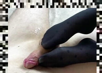 Sexy footjob in black nylon pantyhose from my girlfriend