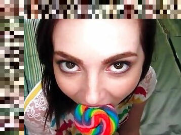 Lollipop licking teen girl sucks on a cock