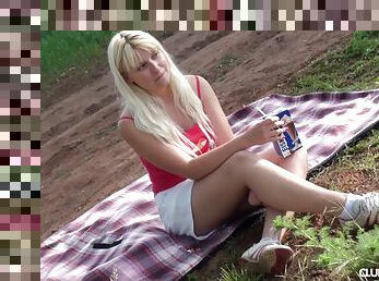 Outdoors pussy fingering session with dashing blonde solo model