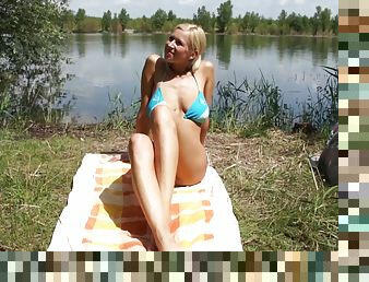 Hot blonde's big tits pop out of her bikini top during hot sex by the lake