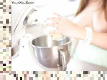 Mary milking in kitchen