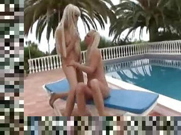 Sluts in shiny swimsuits have lesbian sex outdoor