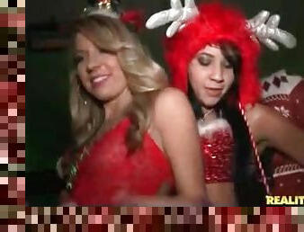 Christmas party at night club with dancing girls