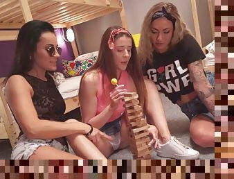 Petite dykes love to finger their pussies in a threesome at a hostel
