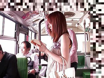 Asian redhead enjoying a nasty threesome on a bus