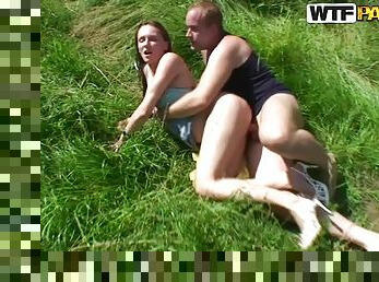 Fucking a Sexy Girl Outdoors on the Grass in Amateur Vid