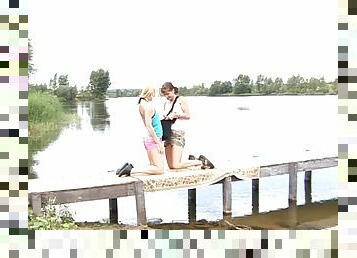 Outdoor loving lesbians get buck wild and fuck on a dock