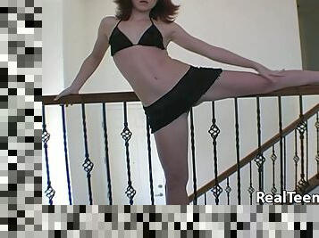 Red Head Solo Model In Black Miniskirt Stripteasing On The Staircase