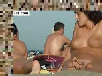 Nude tits and pussy at the beach