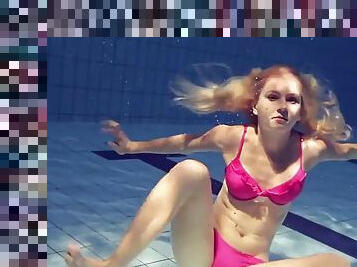 Elena Proklova spreads her legs underwater