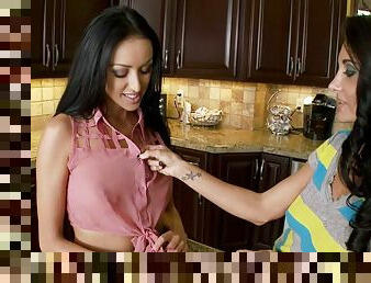Ava Addams and Breanne Benson lick each other's vags in the kitchen