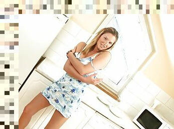 Kitchen action with a kinky blond solo model