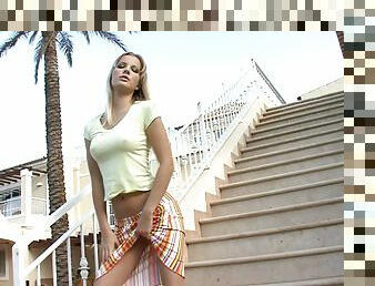 Bessy the pretty blonde masturbates on the stairs