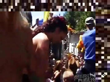 Topless chicks dancing at big outdoor party