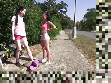 Sporty teen lesbians Daphne and Nicole Love lick pussies outdoors