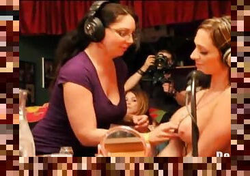 Ladies suck on tits on a radio show