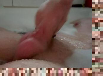 Jerking off while taking a bath