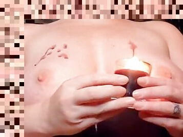 Close Up Hot Candle Wax On Tits