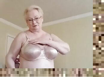 Naughty granny Gilf strips naked for you and spreads her ass
