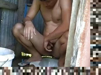Thai hot man jerking off in the toilet