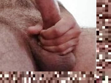 Hairy man jerking off in the hotel room untill he cuns