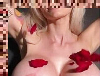 Massive tit bimbo topless with roses