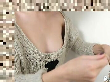 Sexy loose sweater on a British girl flashing her tits