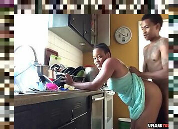 Horny black couple having a great doggystyle fuck in the kitchen